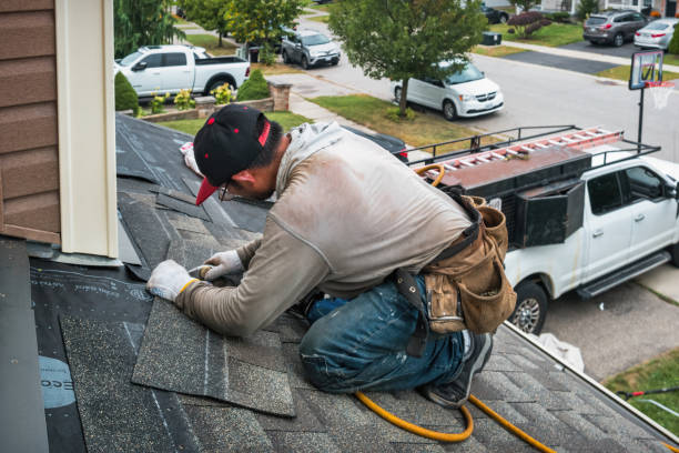Professional Gutter Installation technician working in Benzonia, MI
